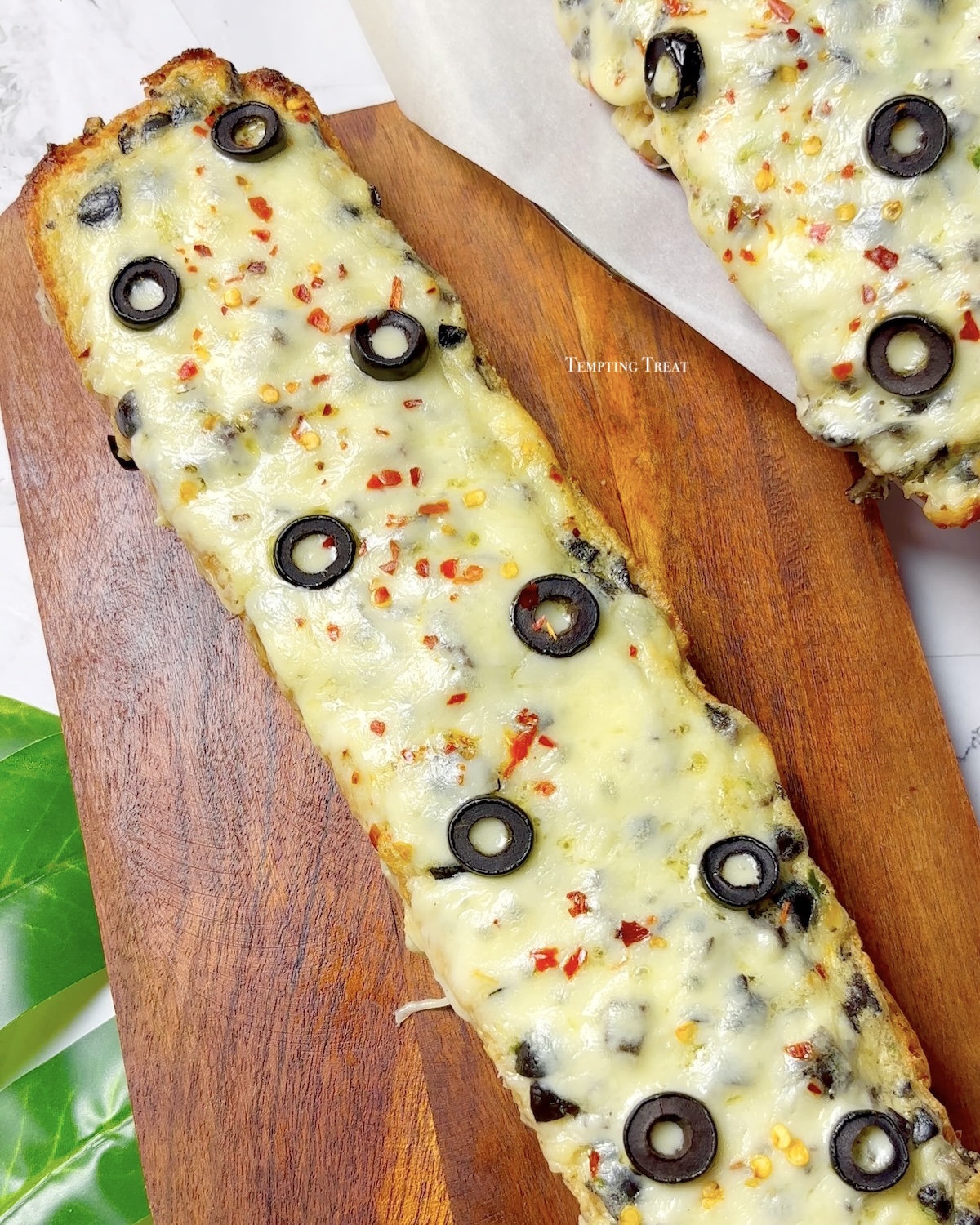 Cheesy Olive Garlic Bread Recipe